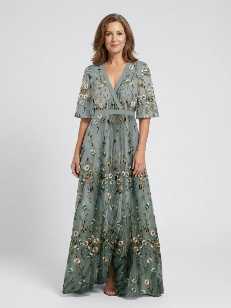 Women's green floral wrap maxi dress with V-neck and flared skirt