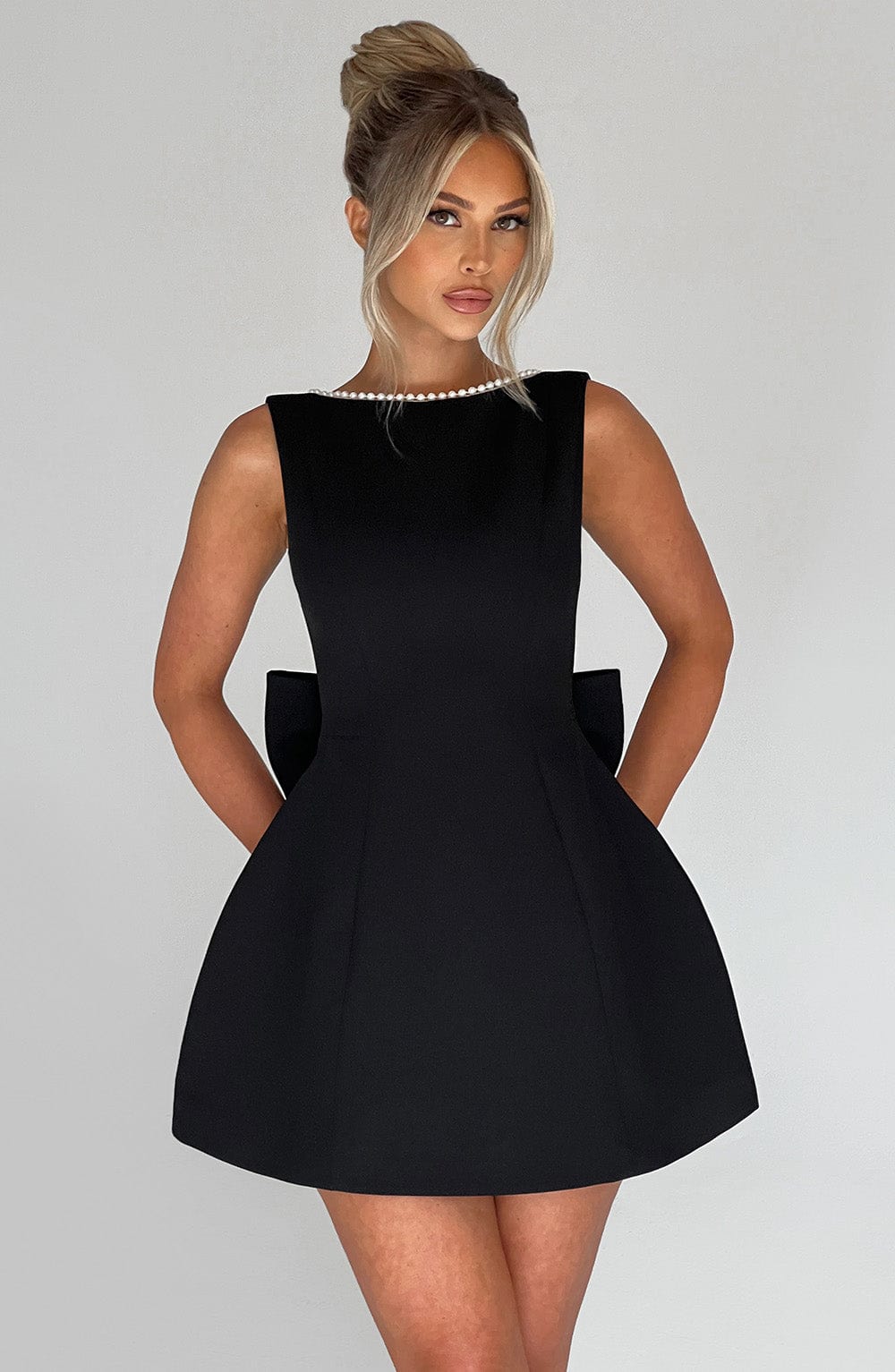 Pearl trim mini dress – back bow view