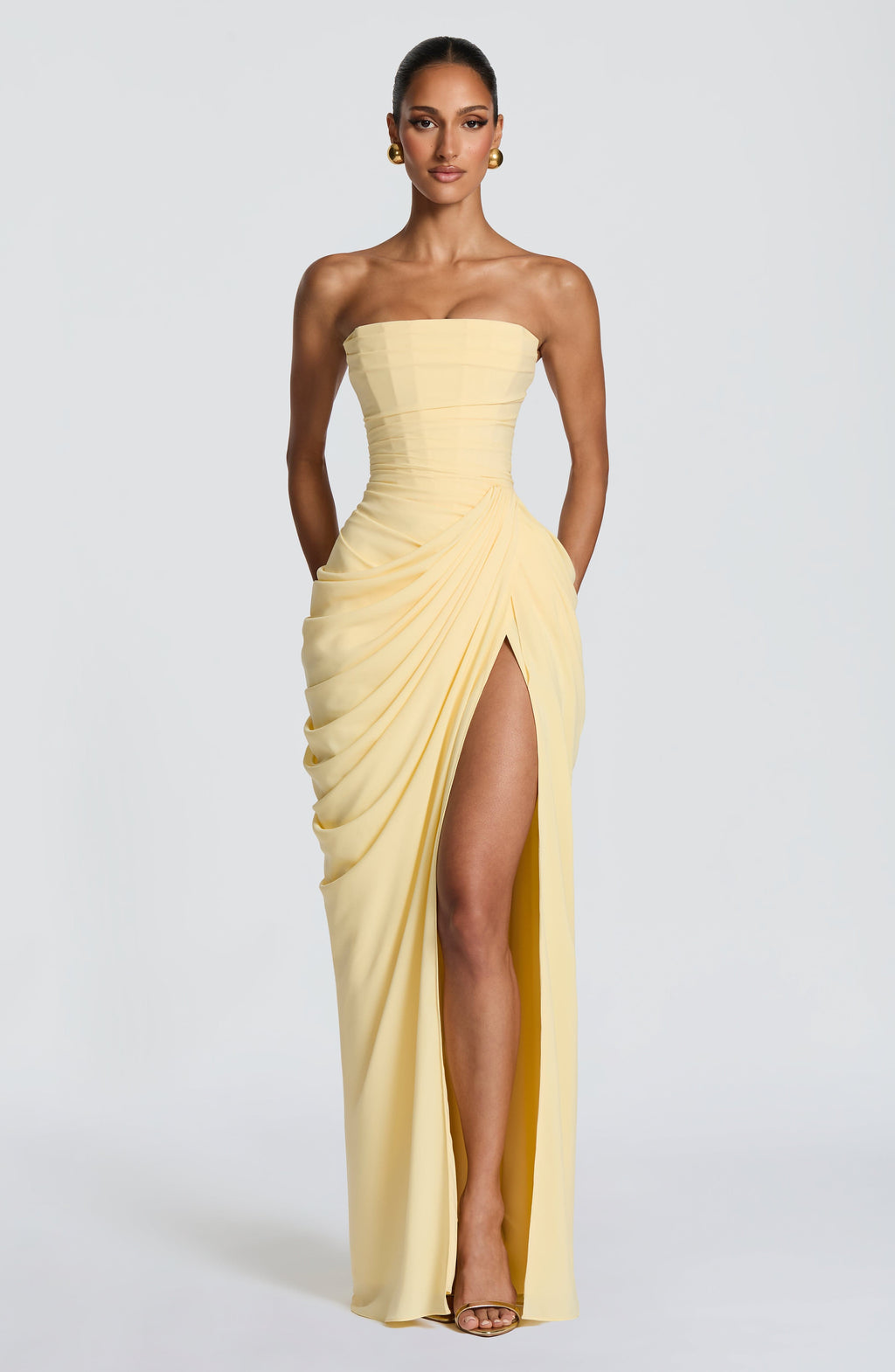 Women's strapless maxi dress with ruched waist and thigh slit