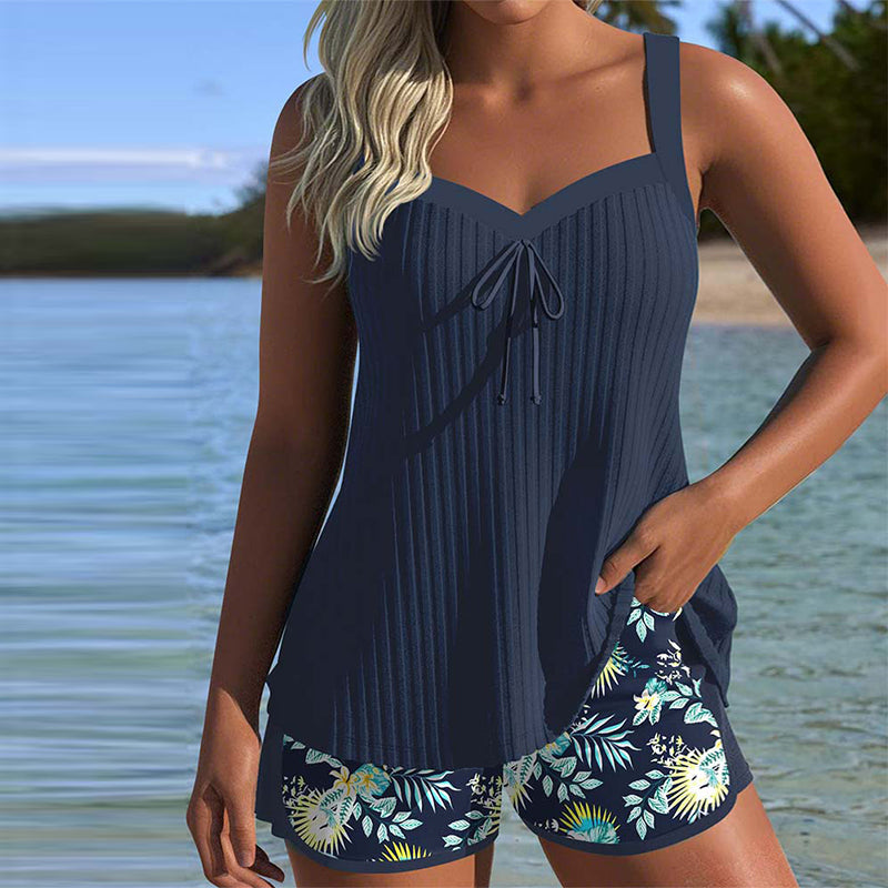 Women's vertical striped tankini top with tummy control panel and swim shorts