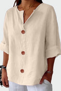 Women's collarless V-neck button-front blouse with short cuffed sleeves